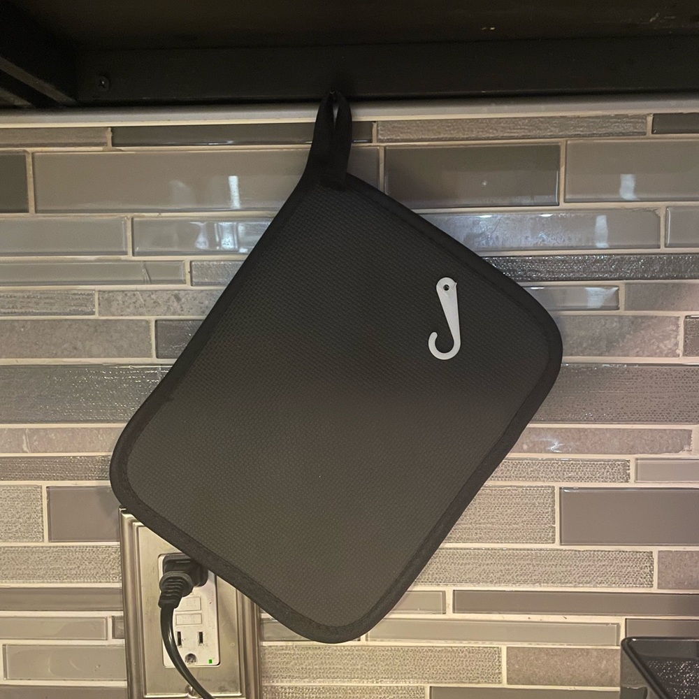 4/$20 Bake and Burn Pot Holder Black with silver text New - Picture 2 of 3